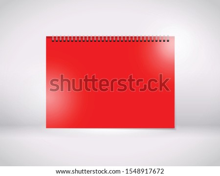 a red paper wiro bind 