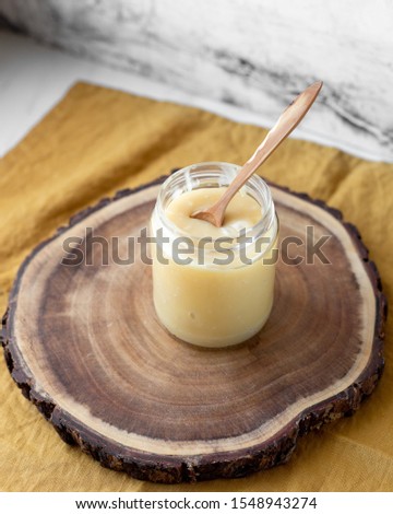 Vegan coconut condensed milk in jar