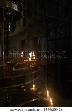 Lighted candles in a church