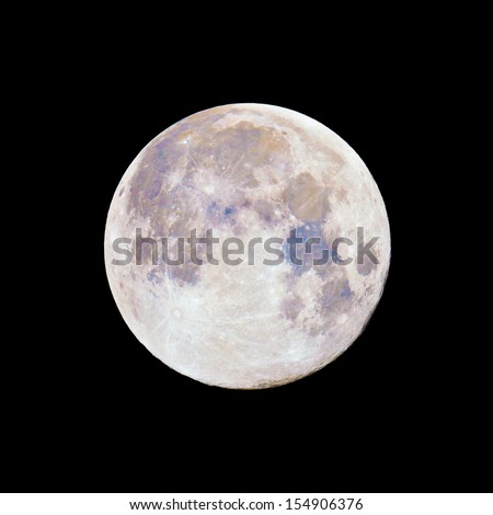 Full moon in color against night black sky