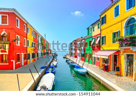 Venice landmark, Burano island canal, colorful houses and boats, Italy. Long exposure photography Royalty-Free Stock Photo #154911044