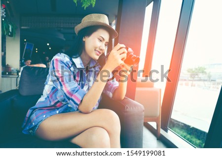 Asian travelling girl, Photographer Travel Sightseeing Wander Hobby Recreation Concept.