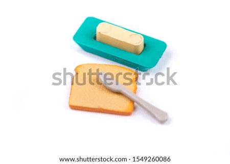 Childs toy plastic food molded 1/6th scale toast, butter container and knife