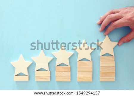 business concept image of setting a five star goal. increase rating or ranking, evaluation and classification idea Royalty-Free Stock Photo #1549294157