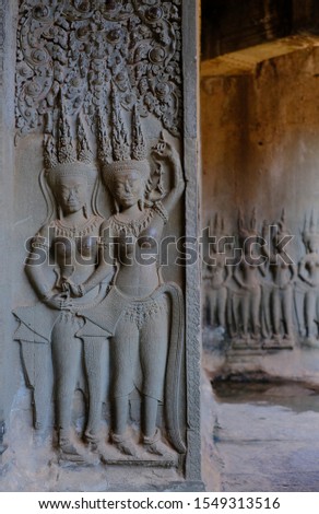  Apsara devas who dancing on the wall at Angkor Wat Temple built in the 12th century in the ancient city at Siem Reap, Cambodia.