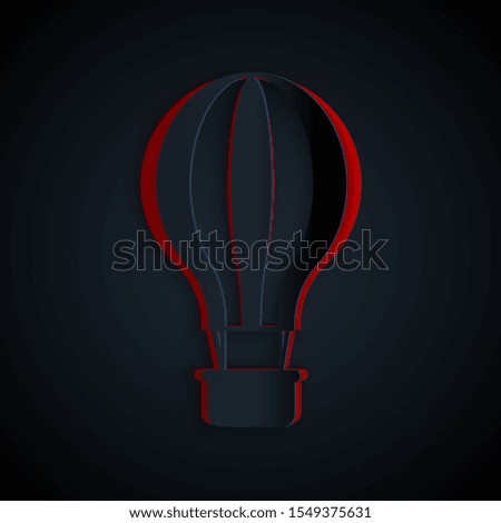 Paper cut Hot air balloon icon isolated on black background. Air transport for travel. Paper art style. Vector Illustration