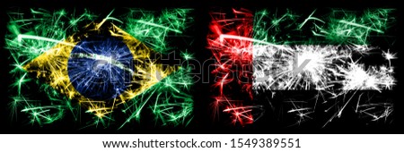 Brazil, Brazilian vs United Arab Emirates, Emirati New Year celebration sparkling fireworks flags concept background. Combination of two states flags.
