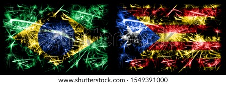Brazil, Brazilian vs Catalonia, Spain New Year celebration sparkling fireworks flags concept background. Combination of two states flags.
