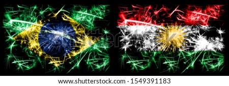 Brazil, Brazilian vs Kurdistan, Kurdish New Year celebration sparkling fireworks flags concept background. Combination of two states flags.
