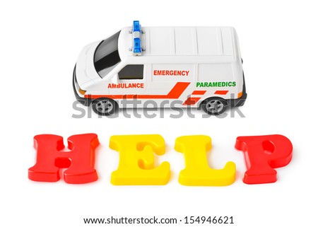 Toy ambulance car and word help isolated on white background