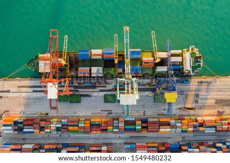 Aerial Shot of Valencia Seaport: Container Ship Loading Operations