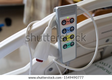 View of Emergency button and remote control for adjust patient bed in hospital. Royalty-Free Stock Photo #1549490777