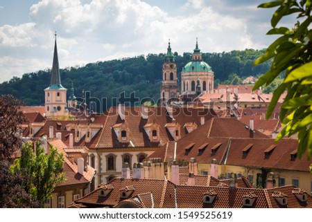 Roof tops towards St Nicholas Church, Prague Royalty-Free Stock Photo #1549525619
