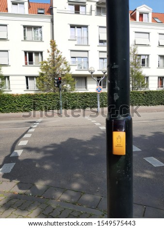 Button on the traffic light for blind people