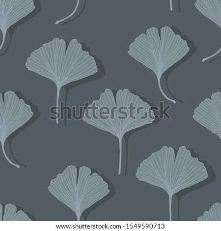 Floral decorative seamless pattern with white and grey ginkgo biloba leaves on dark background. Endless texture can be used for wallpaper, pattern fills, textile, web page background, surface textures