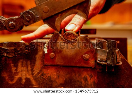 Cigar manufacturing in small scale with traditional tools in Greece Royalty-Free Stock Photo #1549673912