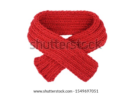 Small red knitted scarf isolated on a white background. Handmade woolen neckwear. Closeup. Copy space Royalty-Free Stock Photo #1549697051