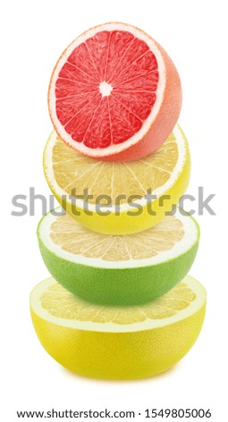 Multicolored composition with heap of halved citrus fruits isolated on a white background.