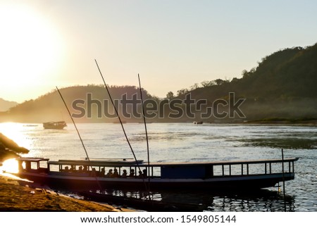 sailing boat at sunset, digital photo picture as a background