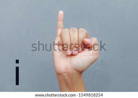  Hand Showing Sign of I Alphabet, isolated on grey background. Sign language                             