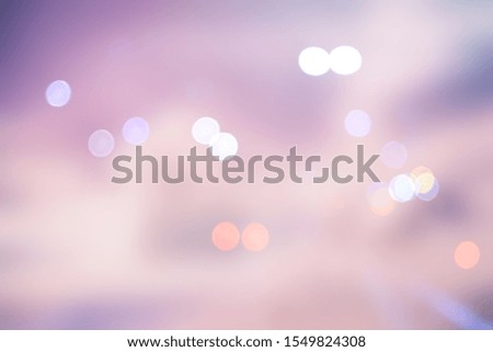 Soft light circular bokeh blurred pastel magenta abstract background