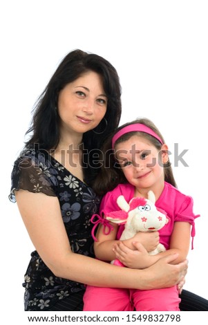 Mother holds on hands of the small daughter