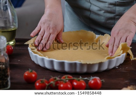 Chef prepare vegetarian homemade pie, Quiche with tomatoes