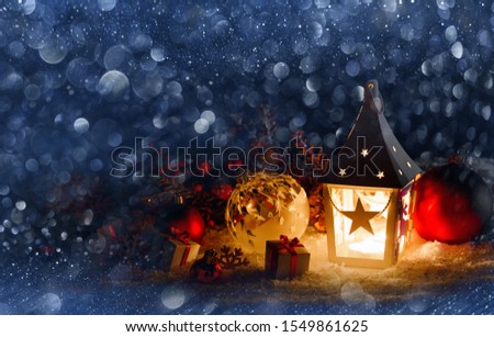 Lantern and christmas decoration on glitter bokeh background