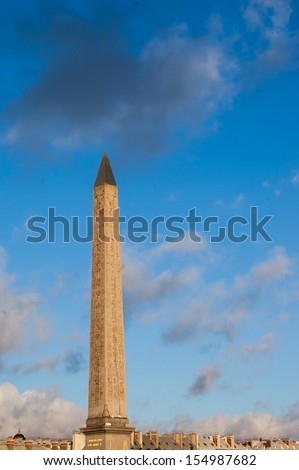 The Luxor Obelisk on the Place de La Concorde in Paris, France. Dramatic sky lighting.