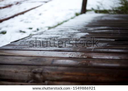 sleet on the wooden porch