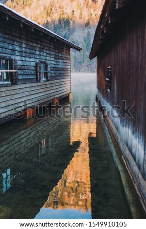 between two small wooden houses