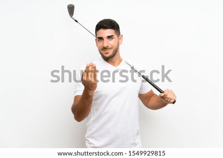 Handsome young golfer player man over isolated white background inviting to come with hand. Happy that you came