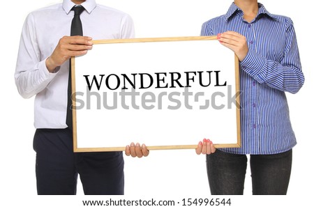 People holding a whiteboard
