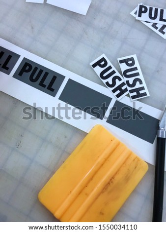 Vinyl Film Application Process of Push and Pull Signs with Tools