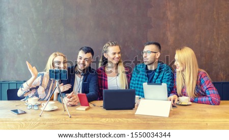 Young happy friends sharing content on streaming platform with digital web camera – Modern influential marketing concept with millennial people having fun vlogging live on social media network