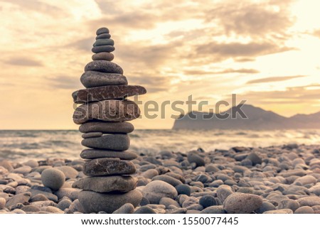 Pyramid of pebbles on the shore of the Black Sea
