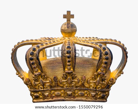 Golden Crown isolated on white background. An old worn gold crown. Shabby aged gilding of the Royal crown. Symbol of King power. Vintage.  Royalty-Free Stock Photo #1550079296