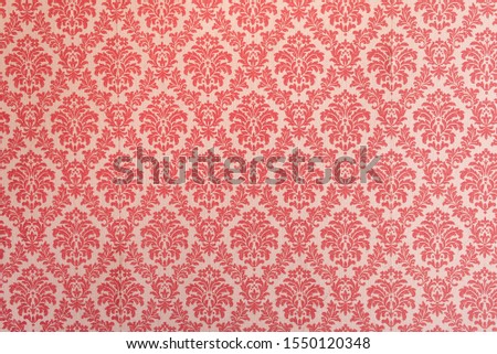 Red wallpaper vintage flock with red damask design on a white background retro vintage style Royalty-Free Stock Photo #1550120348