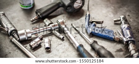 Mechanic tool set in auto vulcanizing and vehicle service workshop. Close up