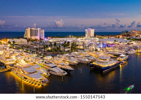 Beautiful aerial photo of amazing boat lights under water Fort Lauderdale yacht show Royalty-Free Stock Photo #1550147543