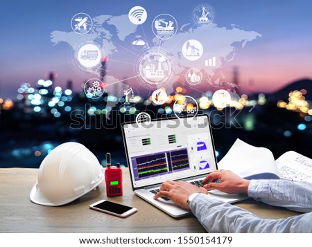 Engineer Industrial working in office at Oil and gas Industry refinery zone,Industry petrochemical concept image and Icon flow automation and connecting data exchange in manufacturing technology.
