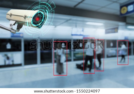IOT CCTV, security indoor camera motion detection system operating with people waiting subway at train station, cctv solution management, surveillance security, safety intelligent technology concept Royalty-Free Stock Photo #1550224097