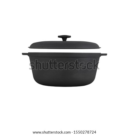 black empty cast iron pot and lid,  isolated  on perfect white background, stock photography
