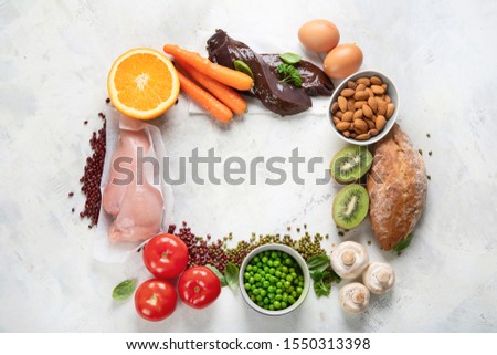 Foods High In Niacin -Vitamin B3 for brain and heart function, skin health,  treat diabetes, ensures the normal functioning of the nervous system.Top view with copy space Royalty-Free Stock Photo #1550313398