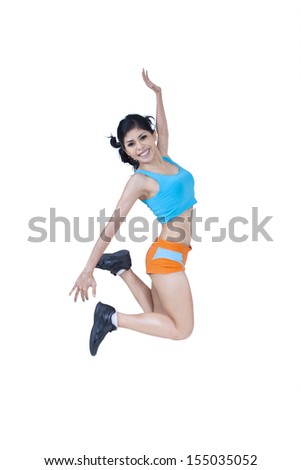 Weight loss fitness woman smiling and jumping of joy