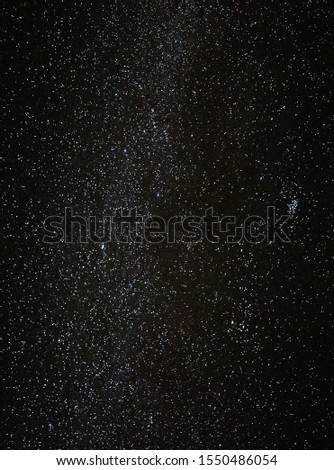 A picture of the milky way, Pleaides cluster and Aldebaran taken in the Ramon crater in the Negev desert