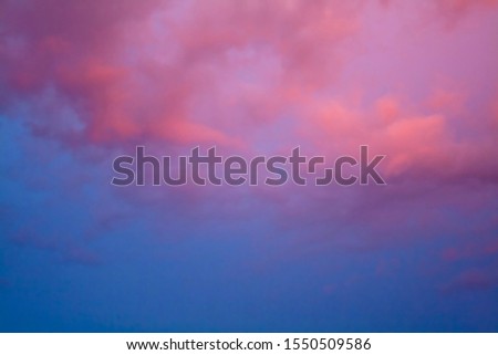 Abstract nature background. Beautiful purple sunset clouds.
