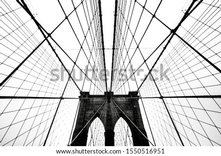 Brooklyn Bridge Geometries  in a black and white picture on a foggy day