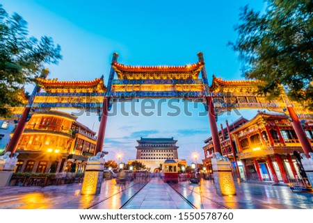 Qianmen street and tourists in Beijing，China with Chinese words in the picture mean "ZhengyangGate".