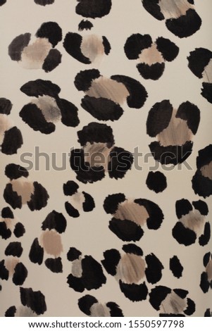 Beautiful fabric background in beige hue, texture of fabric, leopard print, for design, mock-up
